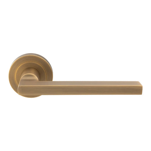 Trentino Lever On Sprung Screw-On Round Rose - Antique Brass