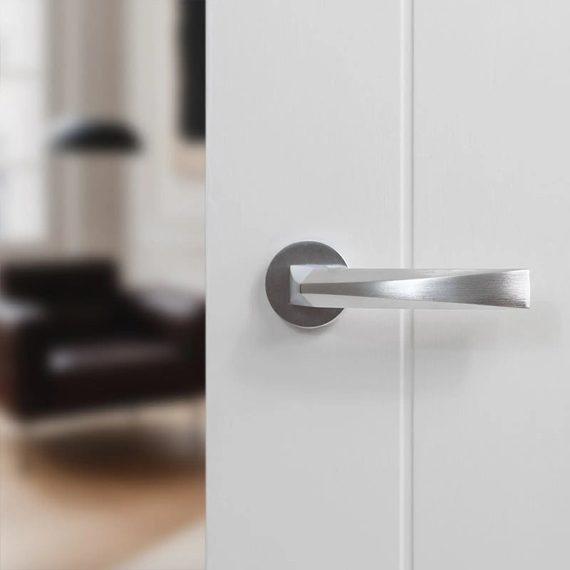 Atlantic Forme Crystal Lever Door Handle on Minimal Round Rose